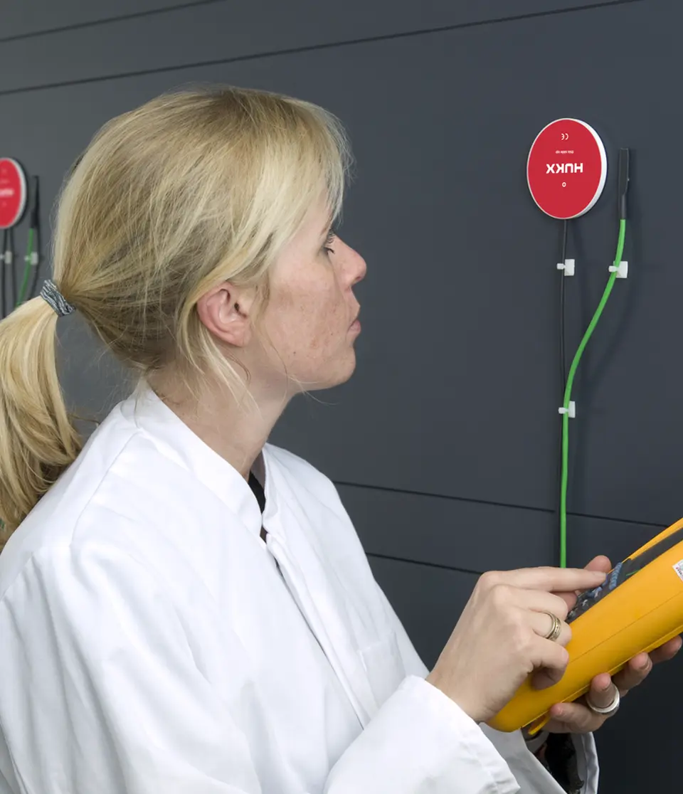HFP01 heat flux sensor mounted on an interior wall for R-value and thermal transmittance measurement according to ISO 9869.